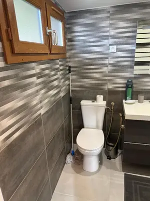 Salle de bains dans l'établissement Charmante cabane rustique en bord de Seine