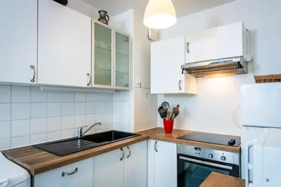 Cuisine ou kitchenette dans l'établissement Appartement City Hall et Parking privé