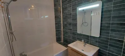 Salle de bains dans l'établissement Dieppe Appartement Vue plage et port