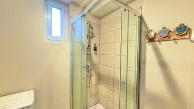 Salle de bains dans l'établissement Abyssea - Appartement Chic Centre-Ville & Netflix