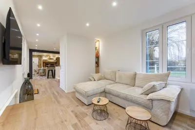 Coin salon dans l'établissement Aux Magnolias - Maison pour 6p