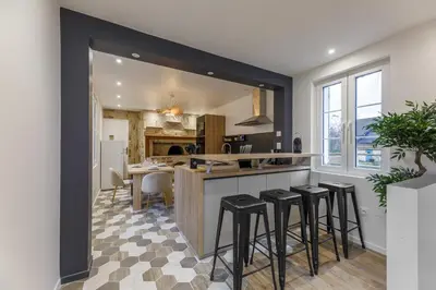 Cuisine ou kitchenette dans l'établissement Aux Magnolias - Maison pour 6p