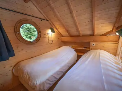 Un ou plusieurs lits dans un hébergement de l'établissement Cabane Flottante avec Terrasse pour 4 pers. à Beauchamps - API-1-52-1739