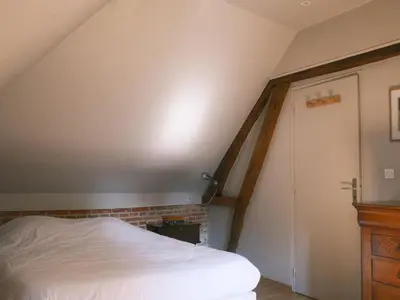 Un ou plusieurs lits dans un hébergement de l'établissement Gîte Cosy avec Terrasse et Cheminée, 6 Couchages - API-1-52-1737