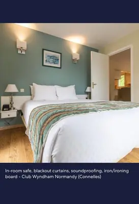 Un ou plusieurs lits dans un hébergement de l'établissement Club Wyndham Normandy is a 3-star aparthotel-style