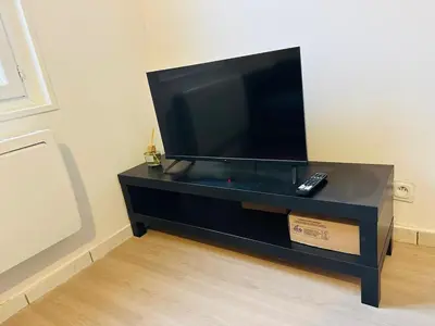 Télévision ou salle de divertissement dans l'établissement Maison Sottevillaise - 423