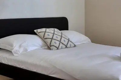 Un ou plusieurs lits dans un hébergement de l'établissement Le Lili's Home élégant F4 proche du centre-ville de Rouen