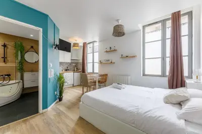 Un ou plusieurs lits dans un hébergement de l'établissement Nid Amour Cabane et Spa Privatif