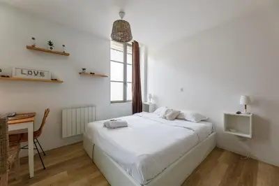 Un ou plusieurs lits dans un hébergement de l'établissement Nid Amour Cabane et Spa Privatif