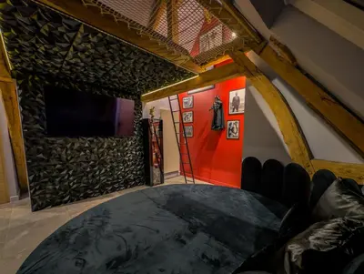 Coin salon dans l'établissement Cinéma Room romantique Studio de l'Etoile