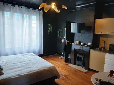 Un ou plusieurs lits dans un hébergement de l'établissement la penombre spa