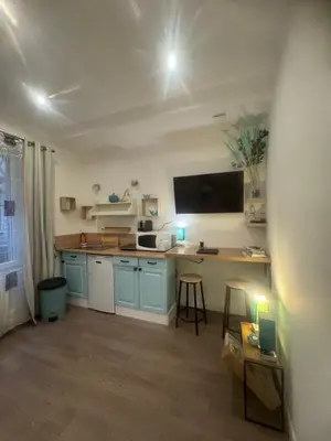 Cuisine ou kitchenette dans l'établissement La douce escapade