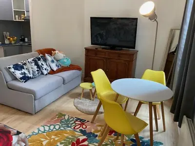 Coin salon dans l'établissement Cosy Bora Bora-Confort pour 4 personnes à Amiens