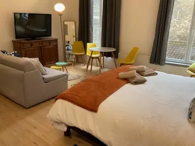 Un ou plusieurs lits dans un hébergement de l'établissement Cosy Bora Bora-Confort pour 4 personnes à Amiens