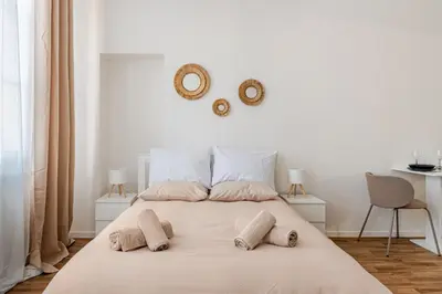 Un ou plusieurs lits dans un hébergement de l'établissement Charmant Studio Cosy - Hyper-Centre D'Elbeuf