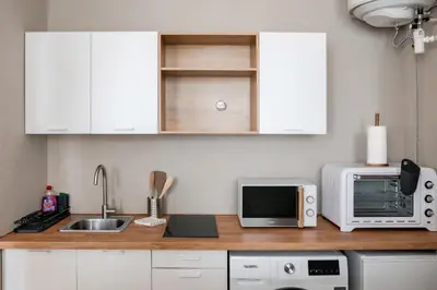 Cuisine ou kitchenette dans l'établissement Charmant Studio Cosy - Hyper-Centre D'Elbeuf
