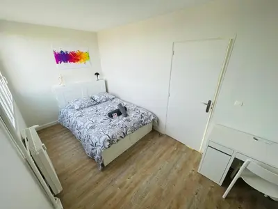 Un ou plusieurs lits dans un hébergement de l'établissement Évasion avec vue panoramique sur Rouen - 424