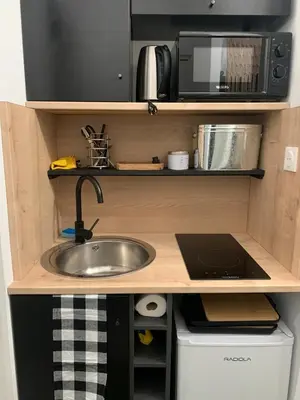 Cuisine ou kitchenette dans l'établissement 50 Nuances Balinaises Secrets d'Adultes