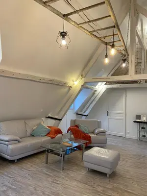 Coin salon dans l'établissement Sous les toits des Jacobins, 3 chambres, WiFi