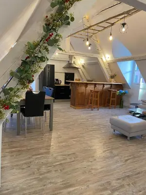 Coin salon dans l'établissement Sous les toits des Jacobins, 3 chambres, WiFi