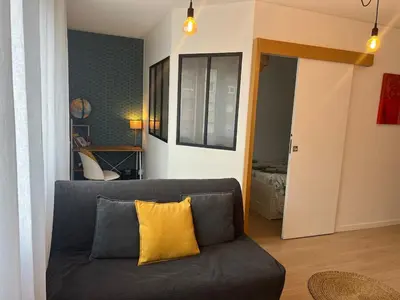 Coin salon dans l'établissement Bel Appartement avec parking proche gare