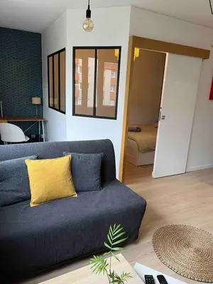 Coin salon dans l'établissement Bel Appartement avec parking proche gare