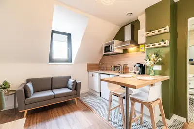 Cuisine ou kitchenette dans l'établissement Charmant T2 cosy et lumineux - 284