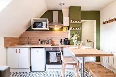 Cuisine ou kitchenette dans l'établissement Charmant T2 cosy et lumineux - 284