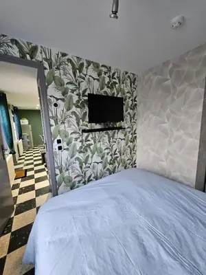 Télévision ou salle de divertissement dans l'établissement Gite 2-4 personnes