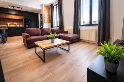 Coin salon dans l'établissement Les Palmiers moderne à 10 min de Rouen