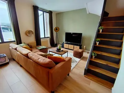 Télévision ou salle de divertissement dans l'établissement Les Palmiers moderne à 10 min de Rouen
