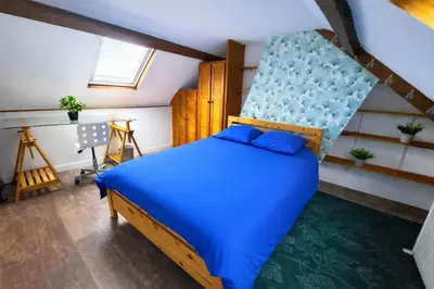 Un ou plusieurs lits dans un hébergement de l'établissement Escapade Rouennaise Séjour Confortable Rouen