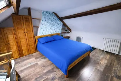 Un ou plusieurs lits dans un hébergement de l'établissement Escapade Rouennaise Séjour Confortable Rouen