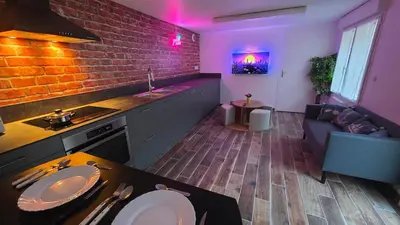 Coin salon dans l'établissement Le Good Vibes