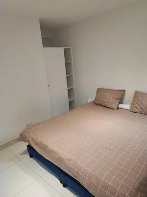 Un ou plusieurs lits dans un hébergement de l'établissement Apartment G