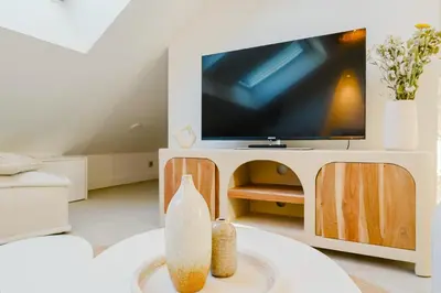 Télévision ou salle de divertissement dans l'établissement Maison Soleil Levant