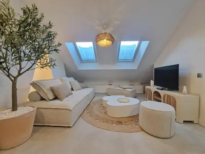 Télévision ou salle de divertissement dans l'établissement Maison Soleil Levant
