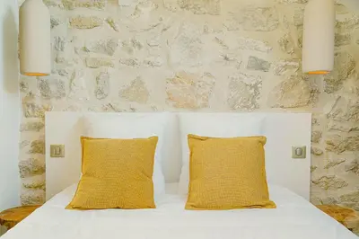 Un ou plusieurs lits dans un hébergement de l'établissement Maison Soleil Levant