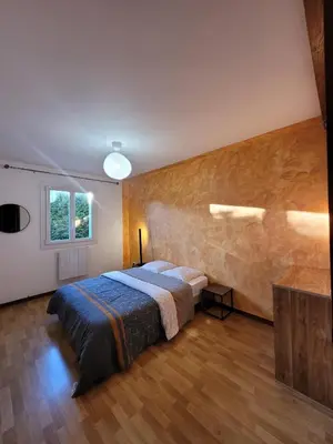 Un ou plusieurs lits dans un hébergement de l'établissement Family home in Gisors