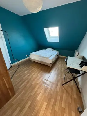 Un ou plusieurs lits dans un hébergement de l'établissement Family home in Gisors