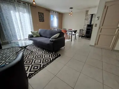 Coin salon dans l'établissement Family home in Gisors