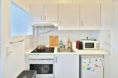 Cuisine ou kitchenette dans l'établissement Le Cosy Chic - Avec jardin et parking