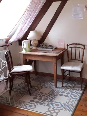 Coin salon dans l'établissement Les Trois Pommiers