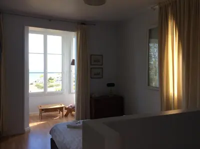 Un ou plusieurs lits dans un hébergement de l'établissement Auberge du Vieux Puits