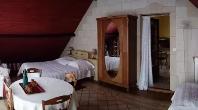 Un ou plusieurs lits dans un hébergement de l'établissement La Maison du Verger