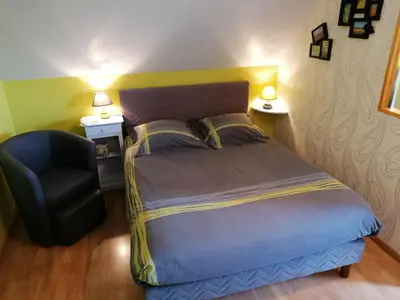 Un ou plusieurs lits dans un hébergement de l'établissement Chambre D'hotes Le Clos Fleuri