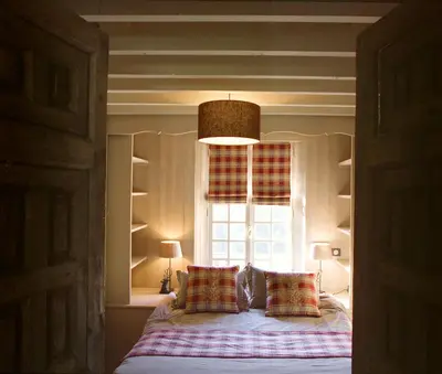Un ou plusieurs lits dans un hébergement de l'établissement Hotel Du Grand Cerf & Spa