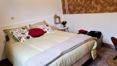 Un ou plusieurs lits dans un hébergement de l'établissement Hôtel restaurant du Commerce