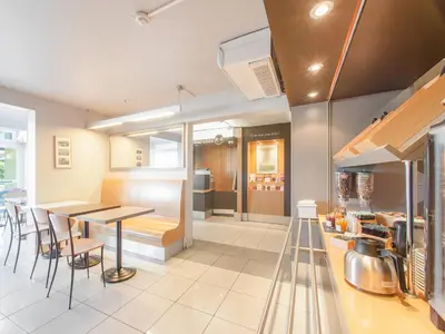 Cuisine ou kitchenette dans l'établissement B&B HOTEL Herblay