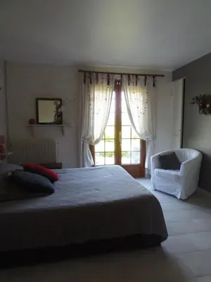 Un ou plusieurs lits dans un hébergement de l'établissement Chambre Du Panorama